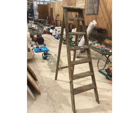 A VINTAGE SEVEN STEP WOODEN STEP LADDER 