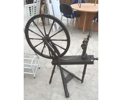 A VINTAGE SPINNING WHEEL 