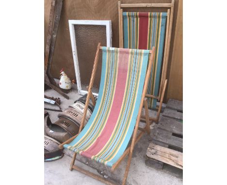 TWO VINTAGE WOODEN FRAMED FOLDING DECK CHAIRS WITH STRIPED CANVAS 