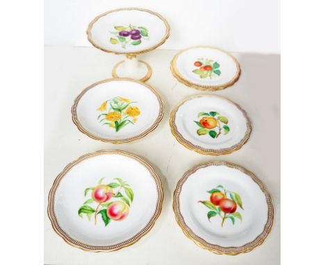 AN ENGLISH PORCELAIN DESSERT SERVICE, PAINTED TO THE CENTRE WITH FRUIT OR FLOWERS IN WAVY GILT RIBBON BORDER, PLATES 22CM DIA