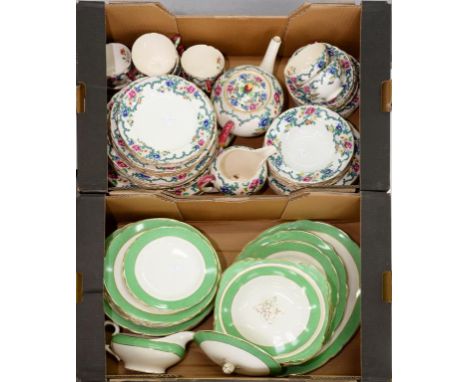 A ROYAL CAULDON EARTHENWARE VICTORIA PATTERN TEA SERVICE AND A SIMILAR POWDER GREEN BORDERED DINNER SERVICE