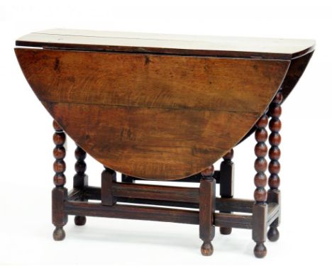 A WILLIAM III OAK GATELEG TABLE ON BOBBIN TURNED LEGS, 99CM X210CM 