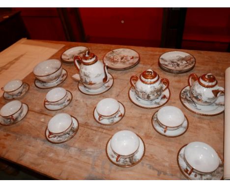 An early 20th century Japanese egg shell porcelain tea service, to include a hot water pot, tea pot, sugar pot, a bowl, 9 cup