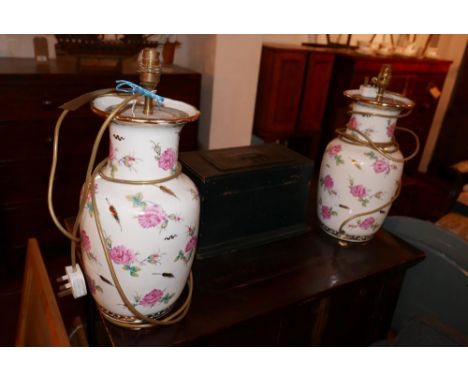 A pair of ceramic vase table lamps, with all over floral and gilt painted decoration, H.46cm (2) 