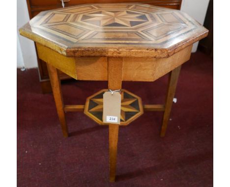 An early 20th Century Continental walnut and parquetry inlaid octagonal occasional table with undertier shelf, H.70cm Diam.60