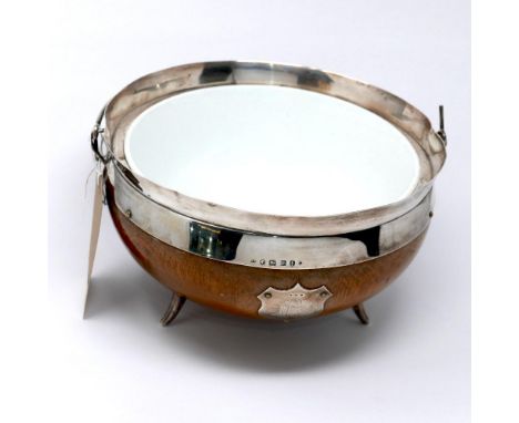 A Victorian silver and oak jardiniere by Henry Bourne, dated 1880, raised on silver peg feet with silver handle, having a Wed