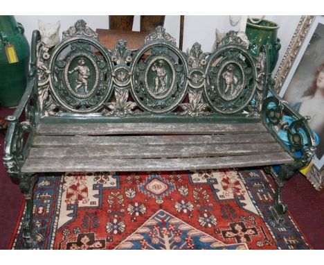 A green painted cast aluminium garden bench, H.84 W.123 D.62cm 