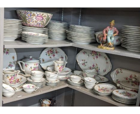 A Limoges Raynaud dinner /tea service to include cups and saucers a pair of treens, dinner plates and side plates and other i
