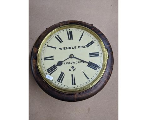 An early 20th century 10" dial clock, signed Wehrle Bros, Lisson Grove NW, and having a Winterholder &amp; Hofmeier movement 