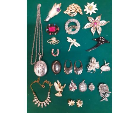 Vintage brooches to include a Trifari gold tone leaf brooch, a Sarah Coventry gold tone flower brooch with pink crystals and 