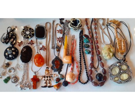 A quantity of vintage costume jewellery, mainly late 20th Century to include a Baltic amber cross pendant on silver tone moun