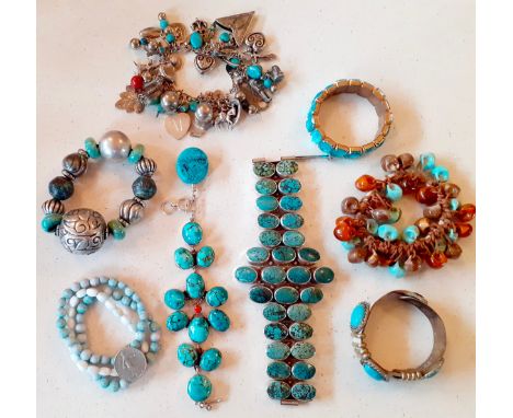 A quantity of turquoise stone and turquoise coloured bead costume bracelets on white metal and silver tone mounts together wi