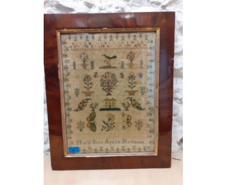 An 1843 sampler worked by Mary Shee, aged 12, depicting a central tree and house amongst flora and plants in pots, 2 butterfl