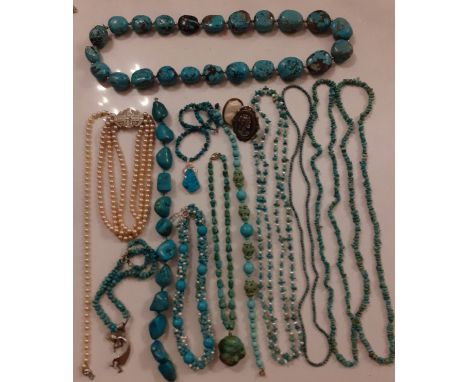 A quantity of vintage turquoise rough-cut and pebble bead necklaces, some with silver claps stamped 925 together with 2 cameo