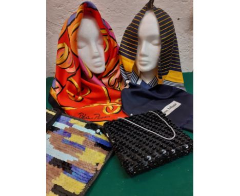 A Paloma Picasso scarf in red, pink, yellow, purple and black together with a Pierre Balmain scarf having yellow, navy and wh