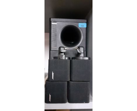 A Bose Accoustimass 5 series II speaker system with four satellite speakersLocation:G 