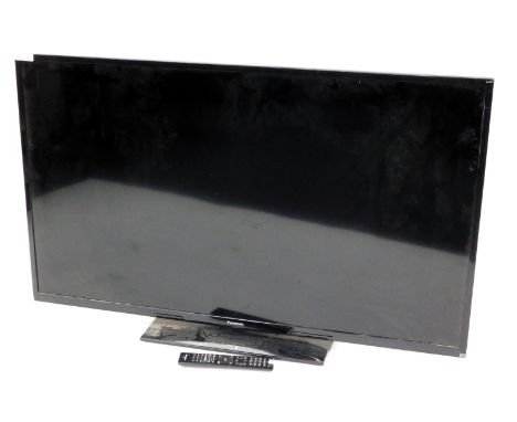 A Panasonic 50" LCD TV, model number TX-50A300B, with remote.