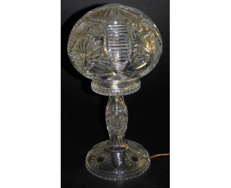 A mid-century cut glass table lamp, with a cut glass shade, engraved with flower heads, 39cm high.