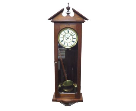 A Gustav Becker wall clock, in a later mahogany case, circular brass dial with chapter ring bearing Roman numerals, subsidiar