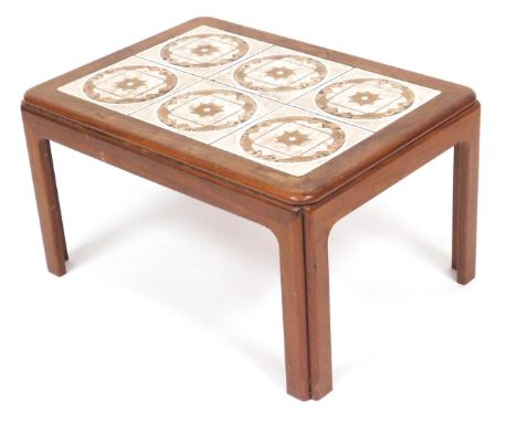 A G-Plan teak and tile top coffee table, inset with six brown floral tiles, raised on straight legs, 40cm high, 72cm wide, 52