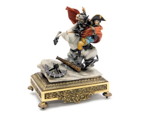 A Capodimonte porcelain figure of Napoleon crossing the Alps, after Jacques-Louis David, modelled by Bruno, raised on a brass