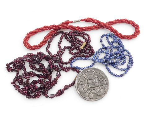 A group of costume jewellery necklaces, to include three agate two strand necklaces, and a hammered pewter Celtic knot brooch