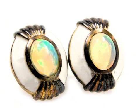 A pair of silver, Ethiopian fire opal and white enamel oval earrings.