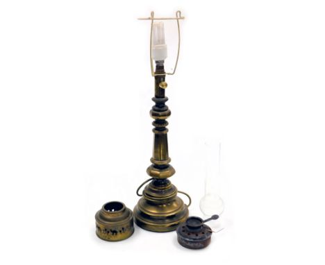 A brass table lamp, possibly converted from an oil lamp base, 61cm high, together with oil lamp fittings. (qty)Buyer Note: WA