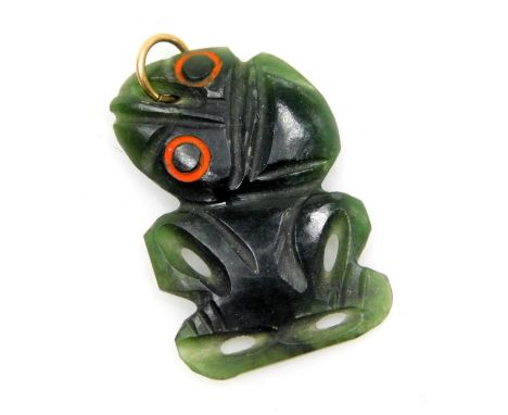 A New Zealand Maori Hei-tiki carved jade pendant, 3cm high.