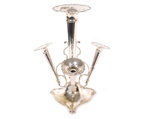 A Victorian silver plated epergne, with a tall central trumpet, flanked by three smaller trumpets, on scrolling supports, abo