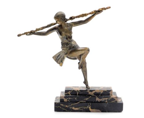 Pierre le Faguays (French, 1892-1962). Dancer of Thyrsus, patinated bronze figure, raised a stepped marble plinth, signed to 