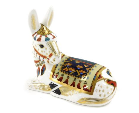 A Royal Crown Derby Imari paperweight, modelled as a donkey, second, silver button.