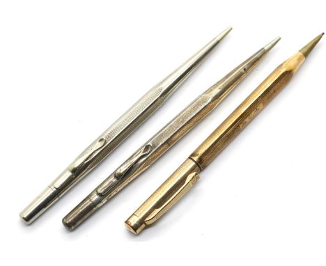 Sterling silver Life Long propelling pencil, a further chromed example and an Eversharp gold plated propelling pencil. P&amp;