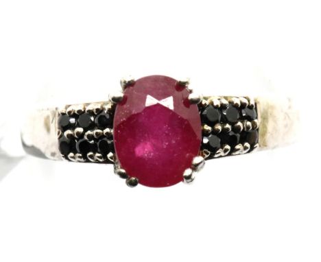 Sterling silver ruby ring with stone set shoulders. Size O, 3.2g. P&amp;P Group 1 (£14+VAT for the first lot and £1+VAT for s