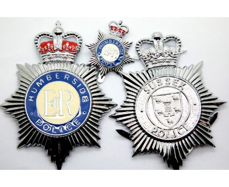 Sussex Police pressed metal helmet plate, Humberside Police enamelled helmet plate and Humberside Police cap badge. P&amp;P G