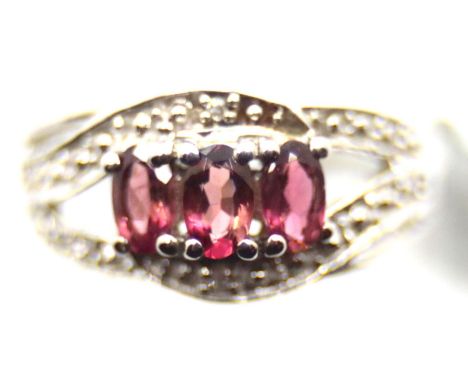 Sterling silver multi coloured gemstone ring (including tanzanite topaz &amp; garnet). With certificate, size O, 5.4g. P&amp;