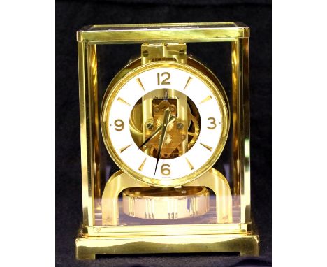 Brass cased Jaeger Le Coultre Atmos clock, the case and glass in good condition, runs then stops. P&amp;P Group 3 (£25+VAT fo
