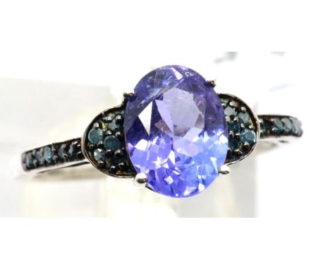 9ct white gold tanzanite and blue diamond ring. With certificate, size O, 2.3g. P&amp;P Group 1 (£14+VAT for the first lot an