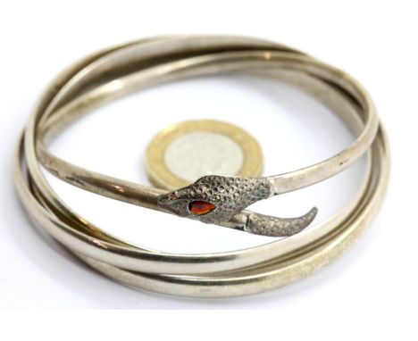 Hallmarked silver trilogy bangle, and a sterling silver stone set snake bangle, combined 43g. P&amp;P Group 1 (£14+VAT for th