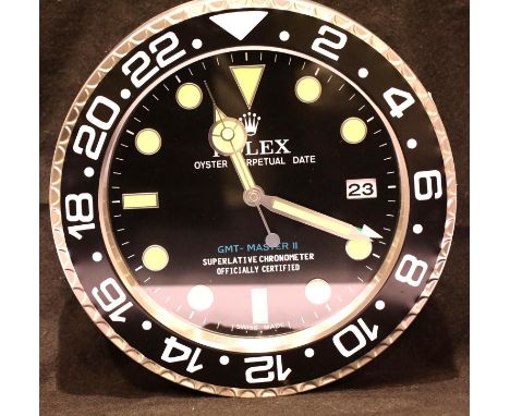 Dealers point of sale wall clock with sweeping second hand, black GMT master dial, working at lotting up, D: 34 cm. P&amp;P G