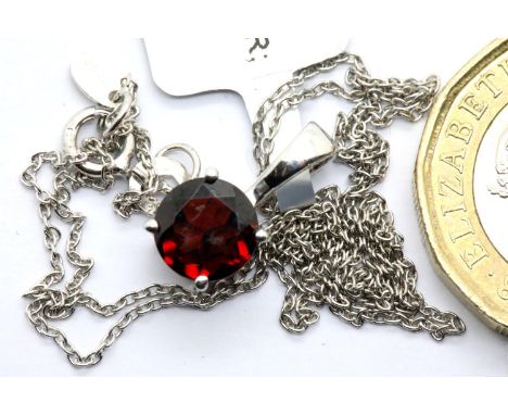 Sterling silver Cuamba garnet pendant necklace, with certificate, chain L: 63 cm. P&amp;P Group 1 (£14+VAT for the first lot 