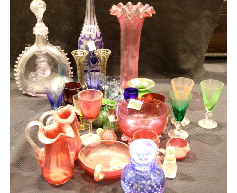 Quantity of antique coloured glassware including Cranberry and silver rimmed scent bottles. Condition report: Decanter does h