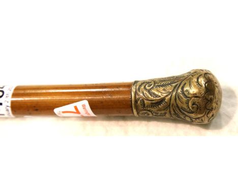 Victorian malacca walking cane with a repousse decorated white metal pommel, L: 87 cm. Condition report: Good used condition,