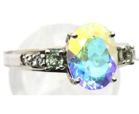Sterling silver topaz ring with sapphire and topaz set shoulders. Size O/P, 3.7g. P&amp;P Group 1 (£14+VAT for the first lot 