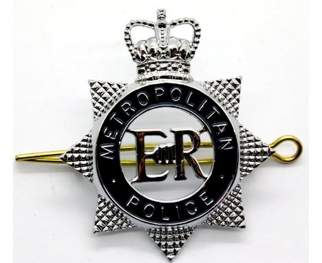 Metropolitan Police enamelled metal cap badge, unused. P&amp;P Group 1 (£14+VAT for the first lot and £1+VAT for subsequent l