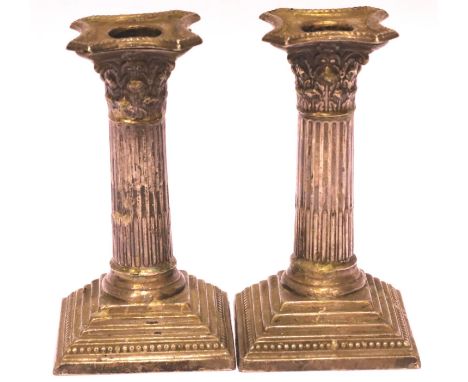 Pair of Victorian hallmarked silver weighted candlesticks, London assay 1894, 667g. P&amp;P Group 1 (£14+VAT for the first lo