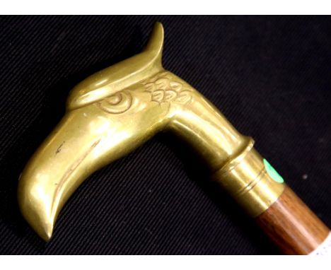 Falcon brass handled walking stick, L: 96 cm. P&amp;P Group 2 (£18+VAT for the first lot and £3+VAT for subsequent lots) 