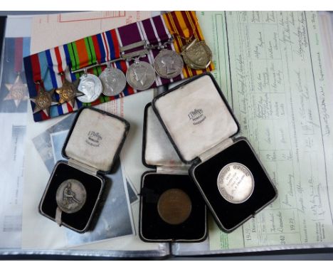 MEDALS - A WWII SEVEN MEDAL GROUP to include Meritorious Service, 1939-45 Star, France and Germany Star, Defence and War meda