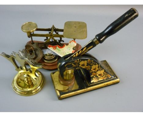 A SET OF BRASS AVERY POSTAL SCALES on a wooden base with five weights, a floral decorated office addressing stamp, a circular