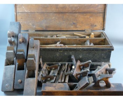 AN OLD PINE WOODWORKER'S CHEST with tools contents and a further quantity of good all wood, some brass mounted woodworking to